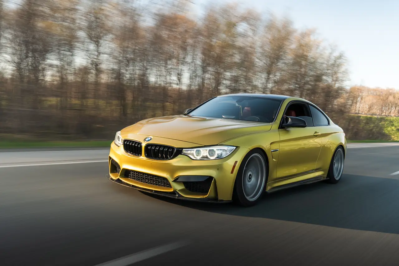 Performance vehicle moving quickly on an open road